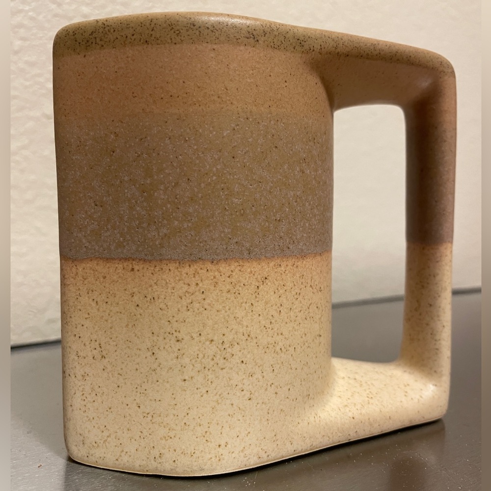 Rodolfo Padilla stacking mugs